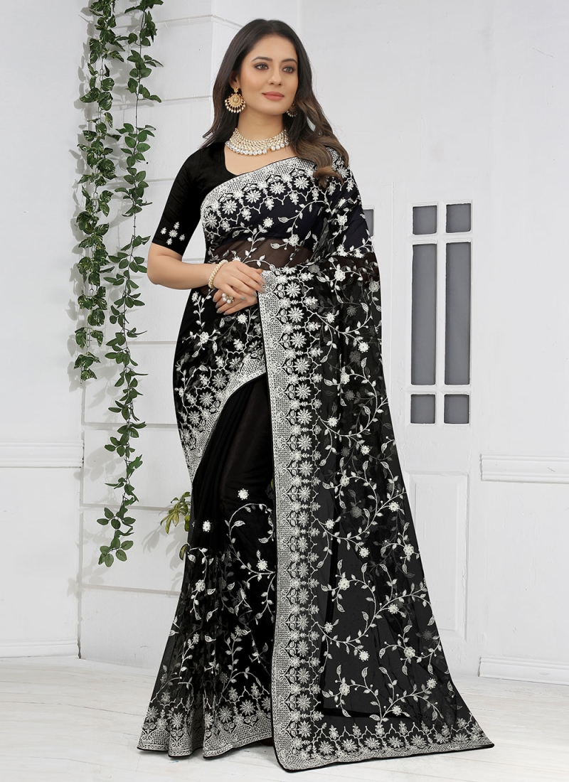 Rashmika Mandanna radiates elegance in white saree and brocade blouse