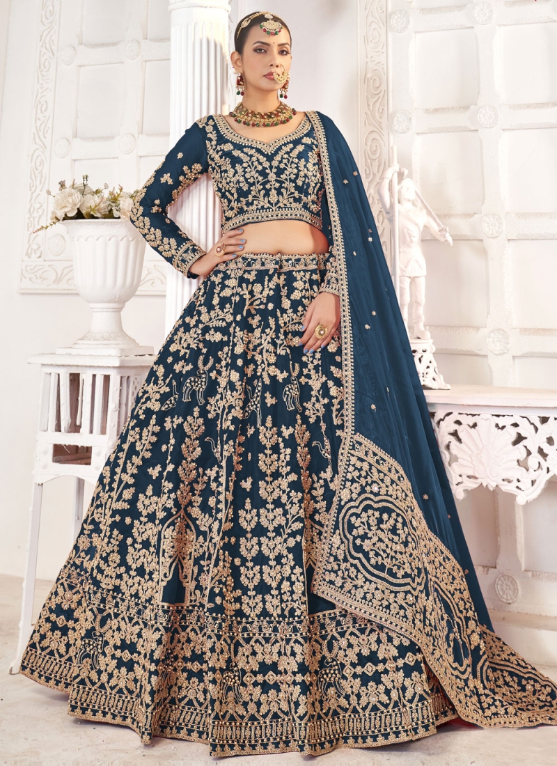 Charismatic Morpeach  and Teal Zari Jimmy Chu Long Choli Lehenga