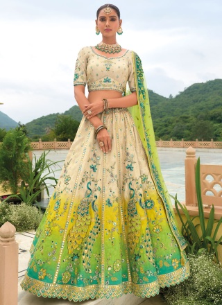 Demure Cream and Green Embroidered Lehenga Choli