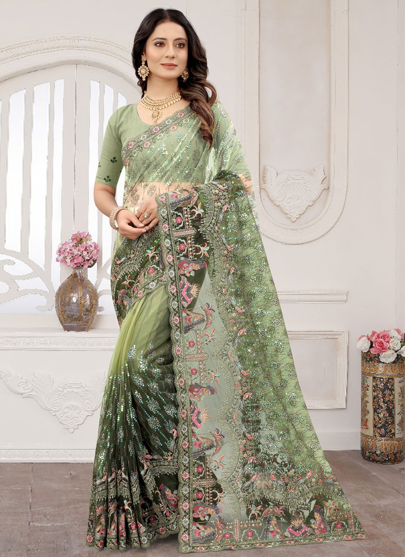 Vani Bhojan looks charming in a traditional green silk saree