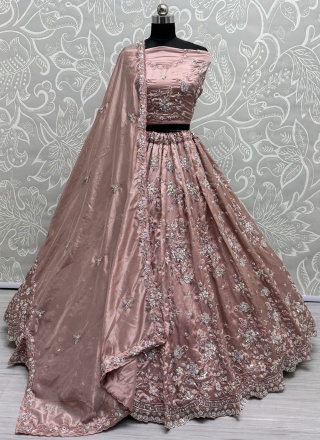 Imposing Peach and Rust Crush Lehenga Choli