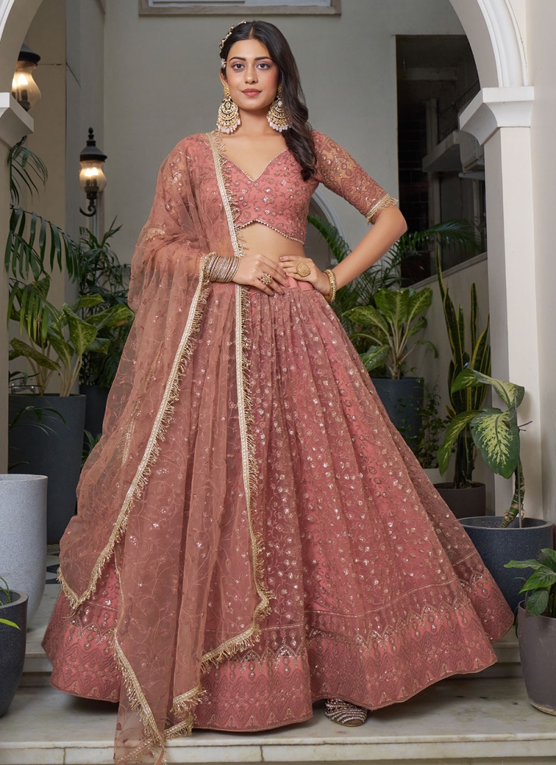 Net Embroidered Designer Lehenga Choli in Rust