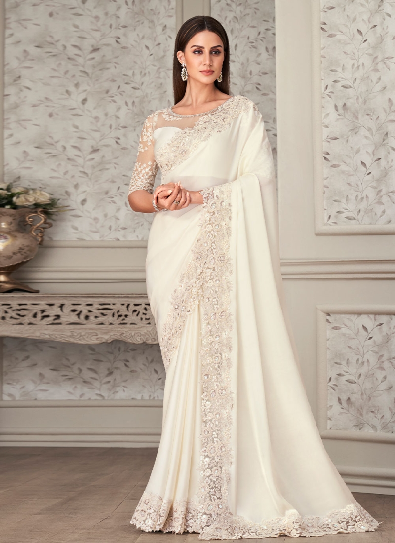 https://www.weddingsurat.com/image/cache/data/outstanding-embroidered-white-contemporary-saree-26833-800x1100.jpg