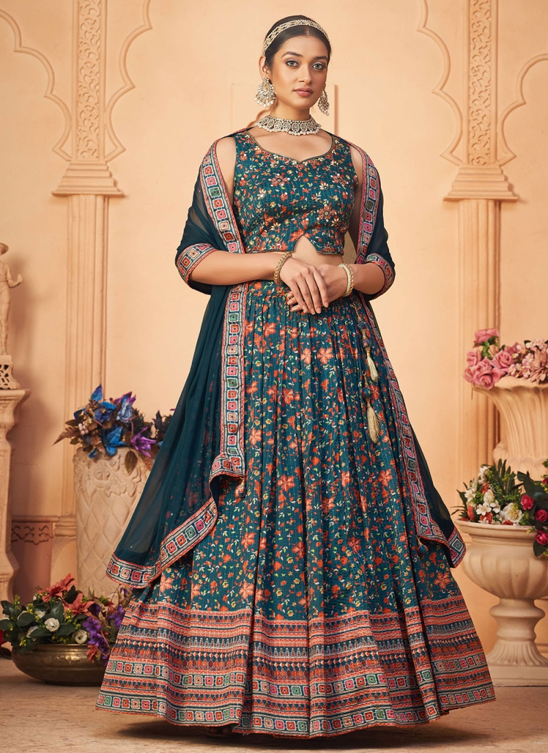 Buy Dull Green Layered Lehenga With Embroidered Raw Silk Blouse Online -  Kalki Fashion