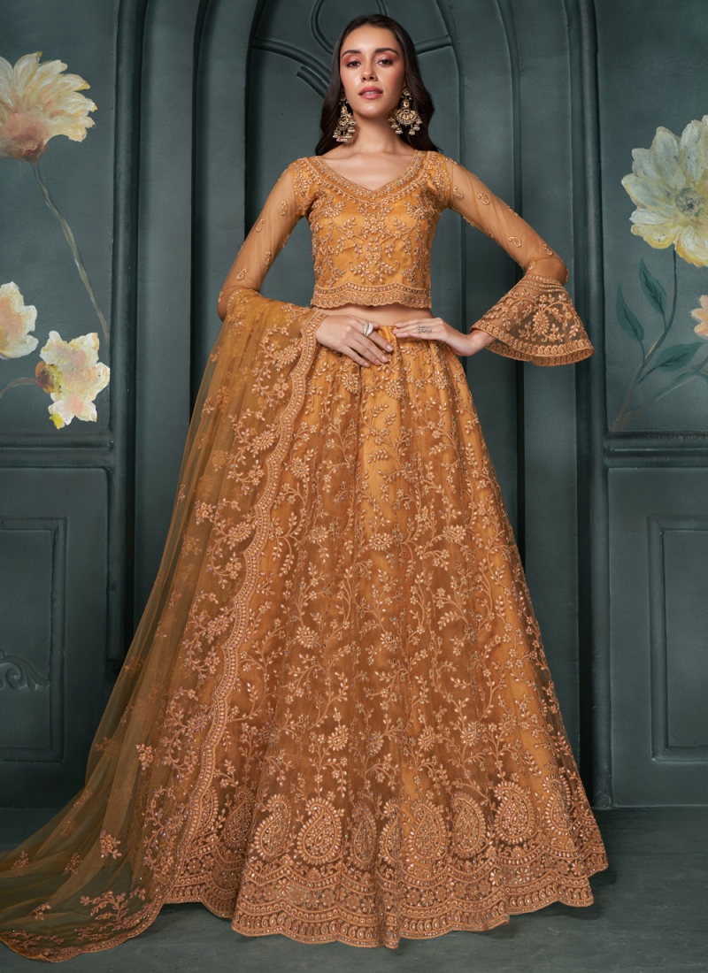 Regal Stone Mustard Net Lehenga Choli