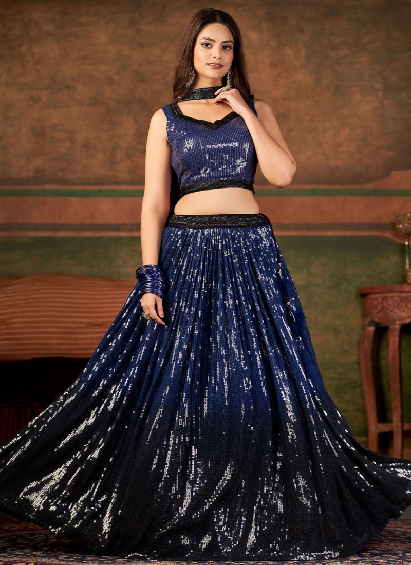 Sparkle in our Navy blue lehengas and Cholis on your special occassion .  Choose from our shimmering collections in our showrooms and…